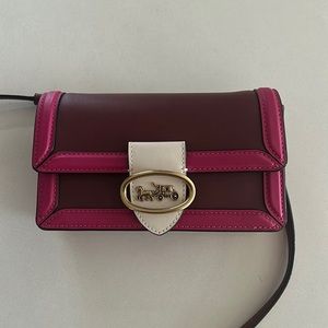 Pink cross body bag